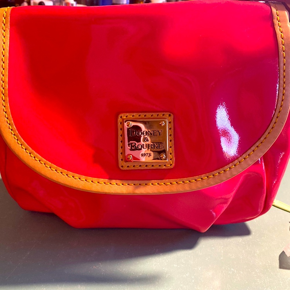 Dooney & Bourke pink patent leather cross body bag
